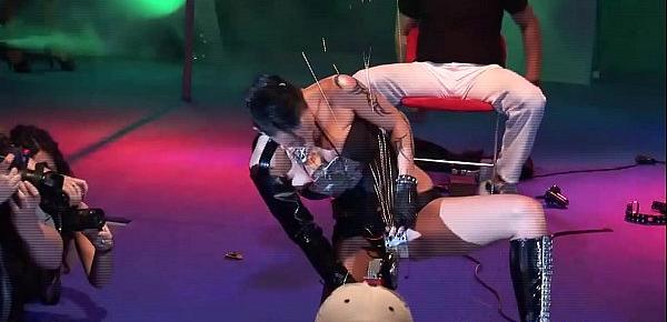  bizarre fetish show on public stage